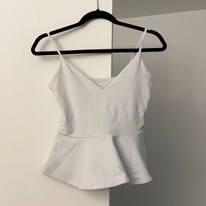 White peplum top
